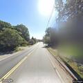 Police follow motorcycle with passenger at low speeds