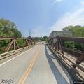 Single car rollover crash blocks Bridge Street