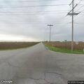 Abandoned SUV partially blocking roadway