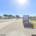 Person experiencing chest pain at bus stop in West Rancho Dominguez