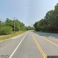 Officer checks green Honda on Raymond Road
