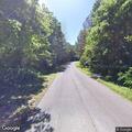 Single-vehicle crash with head and leg injuries
