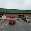 Suspicious person sitting outside Dollar General