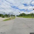 Hit-and-run crash damages stop sign at intersection