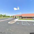 Woman feeling dizzy and nauseous at medical clinic