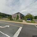 Person sick at UVA Orthopedic Center desk