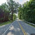 Vehicles slide off road; driver briefly unresponsive