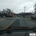 Male running down street screaming for help