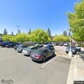 Officer stops yellow car at Pacheco Plaza
