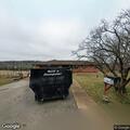 Abandoned camper blocking Main Street in Brumley