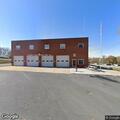 Female possibly intoxicated lying outside fire department
