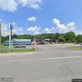 Pedestrian walking in middle of Route 52 roadway