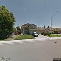Woman with bat screaming near Oriole Lane
