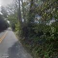 Tree blocking roadway on Ellisville Drive