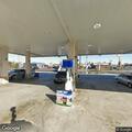 Male with security issues and female in road at AM PM store