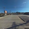 Officer conducts vehicle stop at car wash