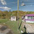 Man in dump truck threatens to hit house with kids