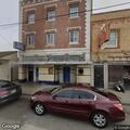 Woman throwing glass items at hotel entrance