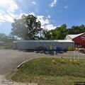 Traffic stop on black Ford Explorer at hardware store