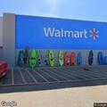 Woman with leg injury and bleeding at Walmart parking lot