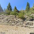 People spray painting cabin near Lower Twin Lakes