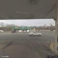 Woman bleeding from mouth in wheelchair van at gas station