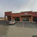 Person with backpack reported behind business
