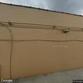 Person screaming behind store near trailer