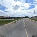 Person lying and behaving erratically near church on Highway (number withheld)