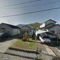 Officer detains person during warrant service