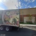 Man circling business and using dumpster