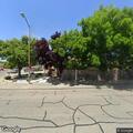 Backyard fire threatens home on Woolner Avenue