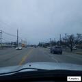 Man with baseball bat yelling near Shelbyville Road