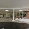 Report of person trying to enter apartment building