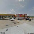 Officers monitor damaged vehicle at Huck’s lot