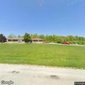 Loose cows blocking roadway near rural address