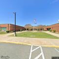 Traffic stop with motorcycle at elementary school