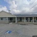 Person experiencing chest pains at pier house