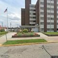 Person unconscious under table at apartment complex