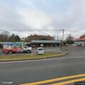 Car reportedly tries to run over officer at store