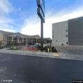 Couple fighting in parking lot, car struck with object