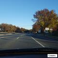 Driver drinking alcohol while swerving in white truck