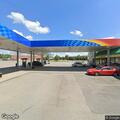Traffic stop on red pickup at Summersville gas station