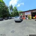 Person requests ambulance evaluation at auto shop