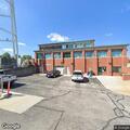 Man vomiting blood after resuming drinking outside police station