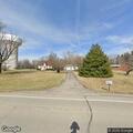 Residents report four men in front yard at night