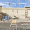 Man walking into street, screaming by Walmart on Alamo