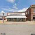 Person injured by stabbing or gunshot at business