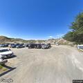 Person injured on beach at river mouth near ocean