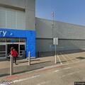 Elderly woman riding cart checked at Great Bend Walmart
